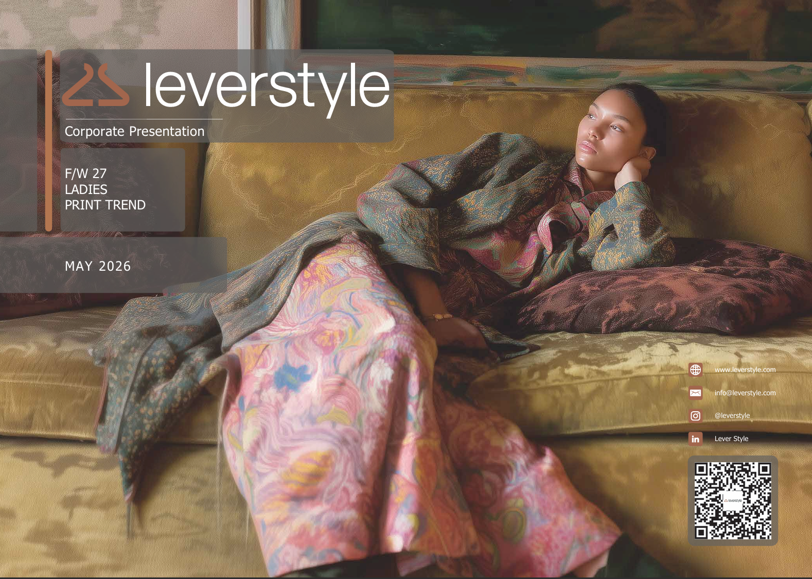 FW27 Ladies Print Trend cover: model reclining in printed silk on a gold sofa